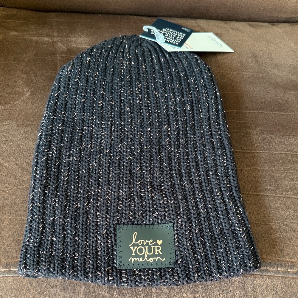 Love Your Melon Loveknit Hat in black with rose gold flecks. Gorgeous!!